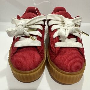 Puma Women’s Size 4 1/2 
Red Sneakers with White Laces
With extra red laces
